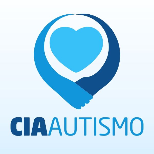 Pessoas em um ambiente acolhedor e informativo, representando suporte e conhecimento sobre o autismo.